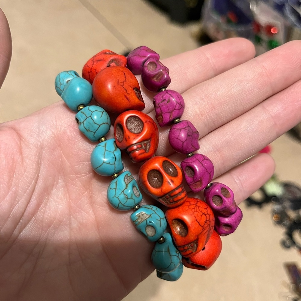 Three skull stone bracelets